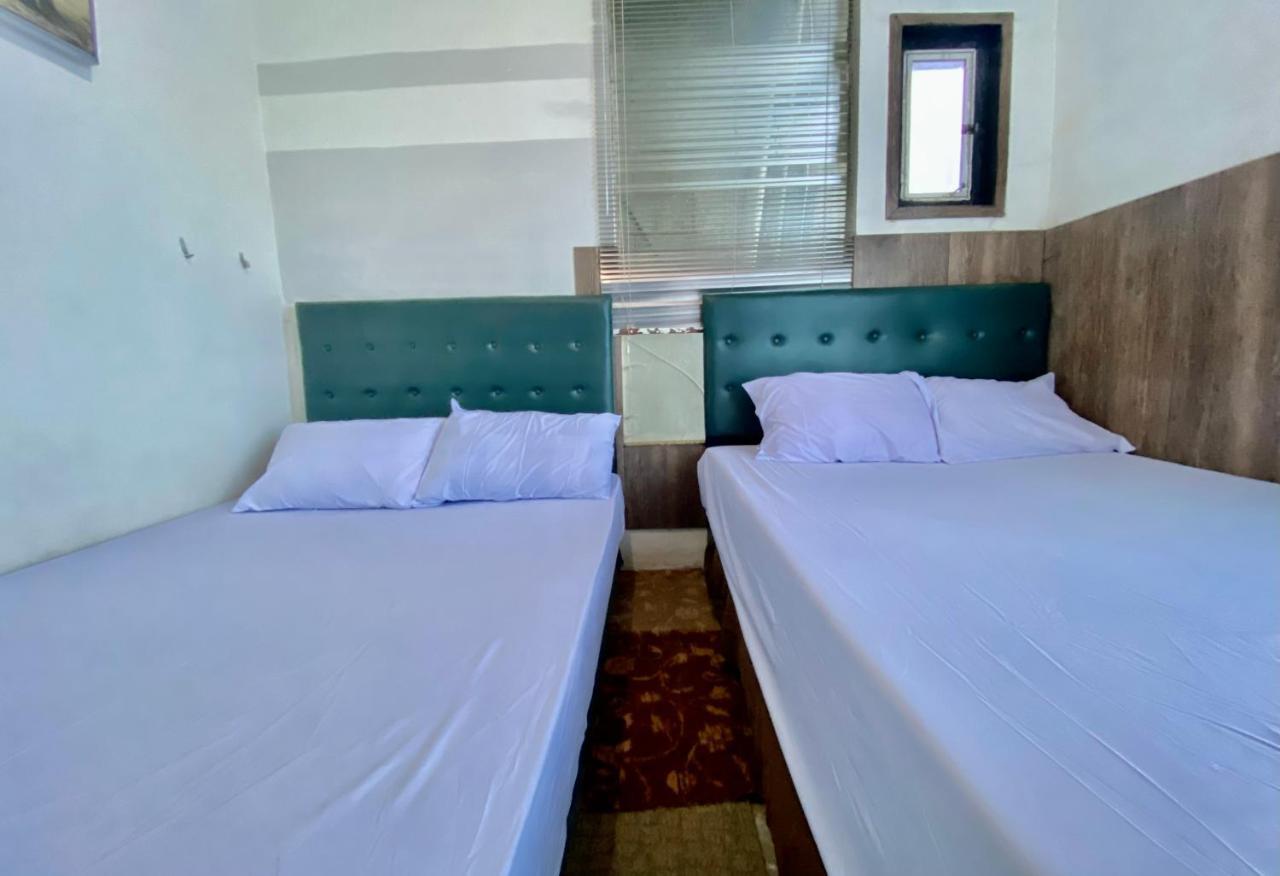 Homestay Batu Kelir Syariah Dieng Mitra Reddoorz Diyeng Exteriör bild