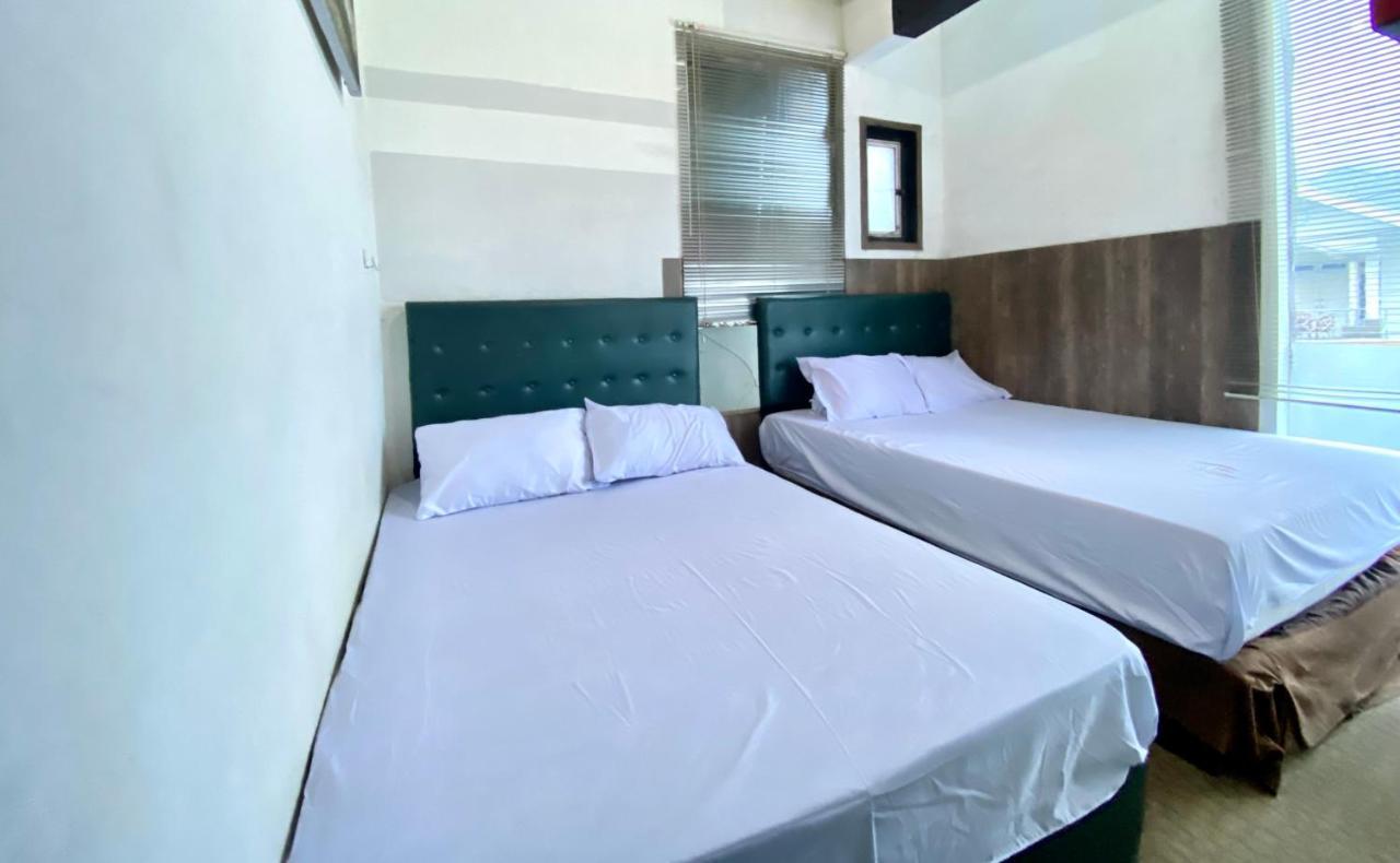 Homestay Batu Kelir Syariah Dieng Mitra Reddoorz Diyeng Exteriör bild